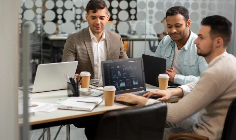 Members of a community group collaborating around a table